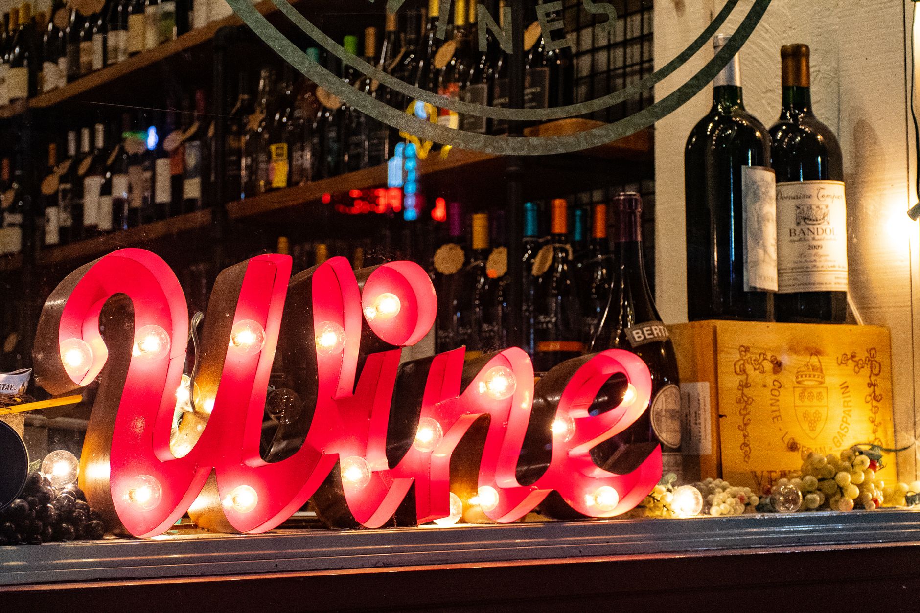 red wine marquee signage on table